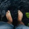 Man looking at his toes
